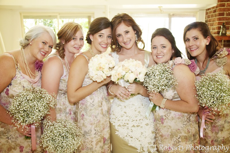 Bride with her bridesmaids in floral dresses - wedding photography sydney